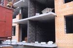 Межквартирные стены из керамзитных блоков в элитном жилом комплексе на пр. М. Тореза, д.71